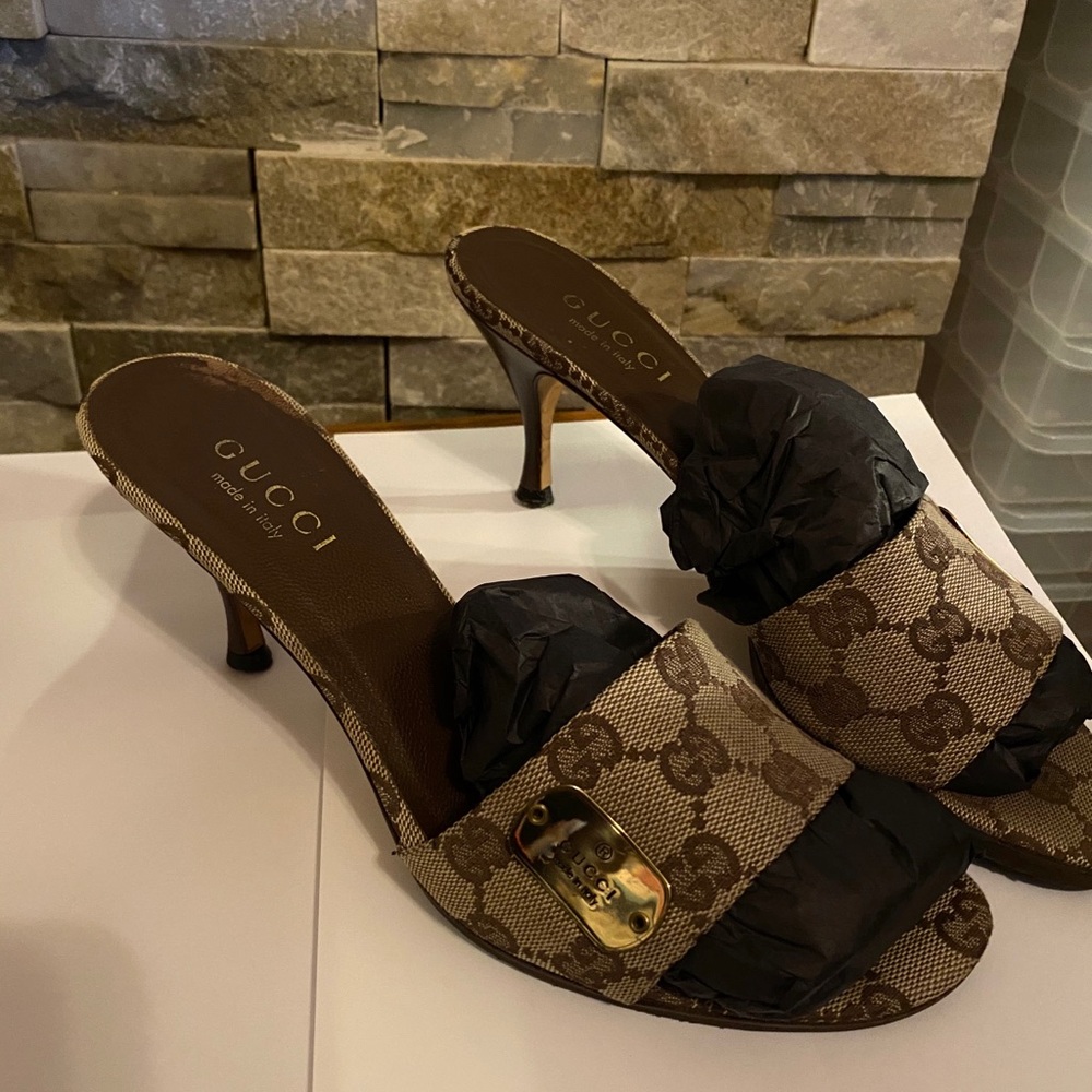 Monogram Gucci Mules.